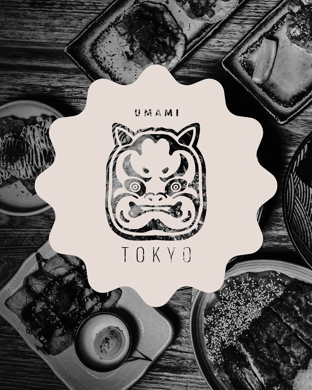 Umami Tokyo brand — Oni mask logo surrounded by Japanese small dishes in black and white